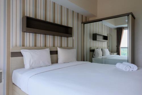 Bumi Serpong Damai Apartment | Cozy 1BR at Casa De Parco Apartment By Travelio