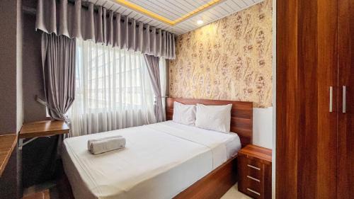 Panakkukang Apartment | Cozy 2BR at Royal Makassar Apartment By Travelio