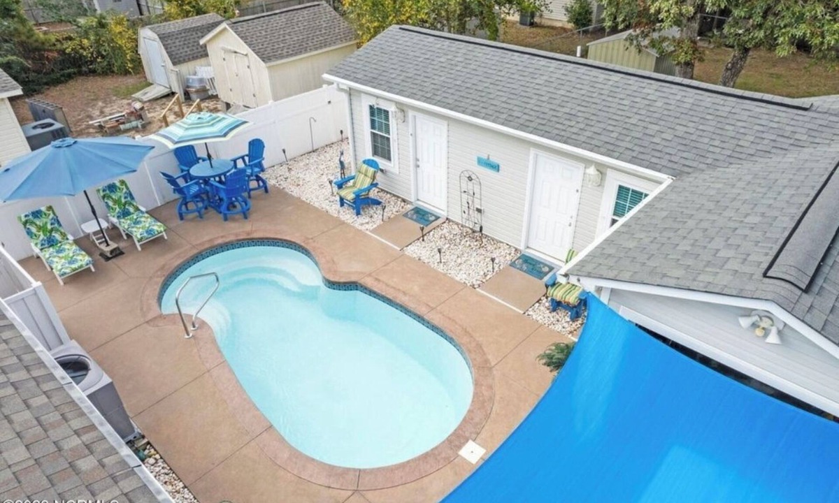 Tranquil Harbour House | Cozy 4 Bedroom beach bungalow with private HEATED pool & golf cart.