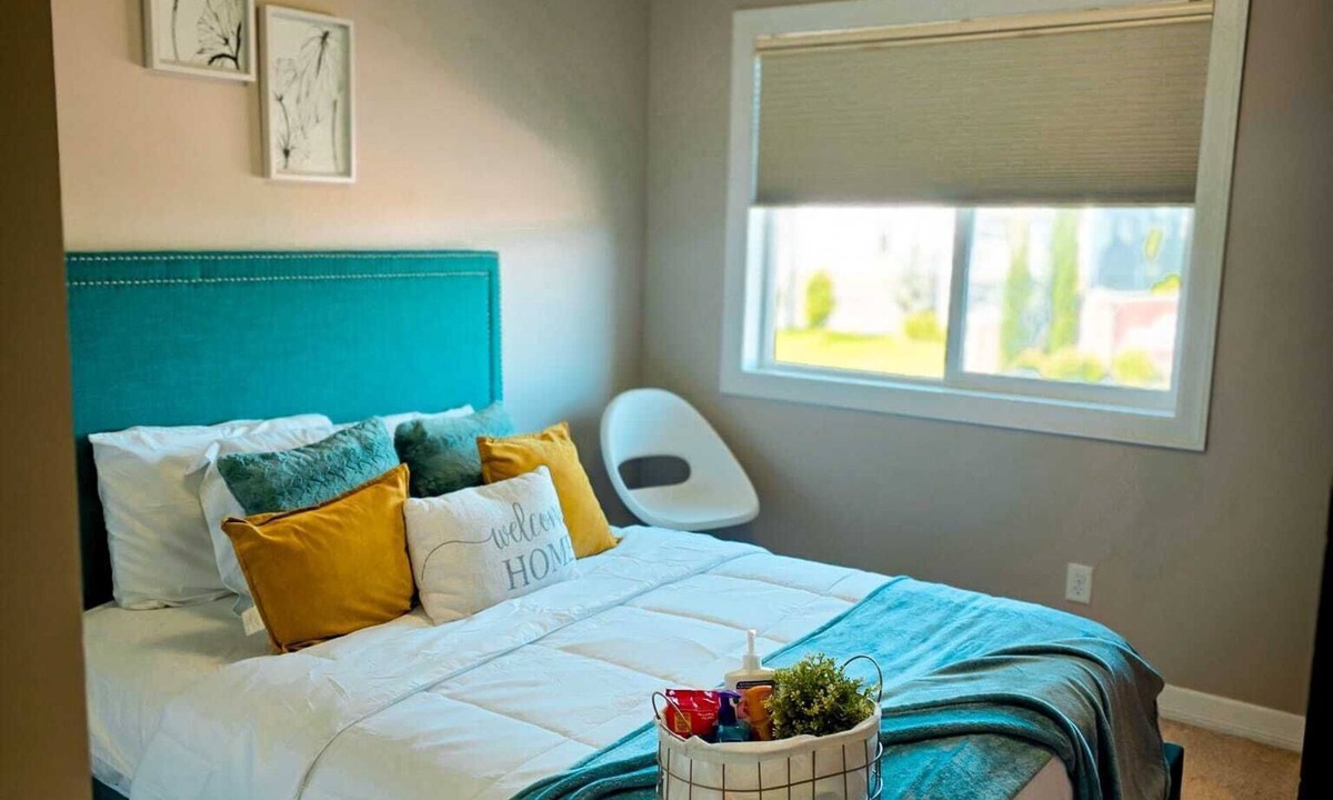 Southeast Calgary House | Cozy bedroom in a townhouse in Copperfield Calgary