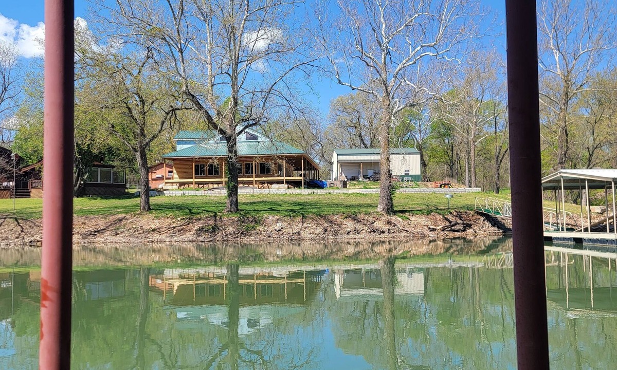 Grove Cabin | Cozy cabin in delightful Grove with boat dock and slip, WiFi, AC, and wood stove