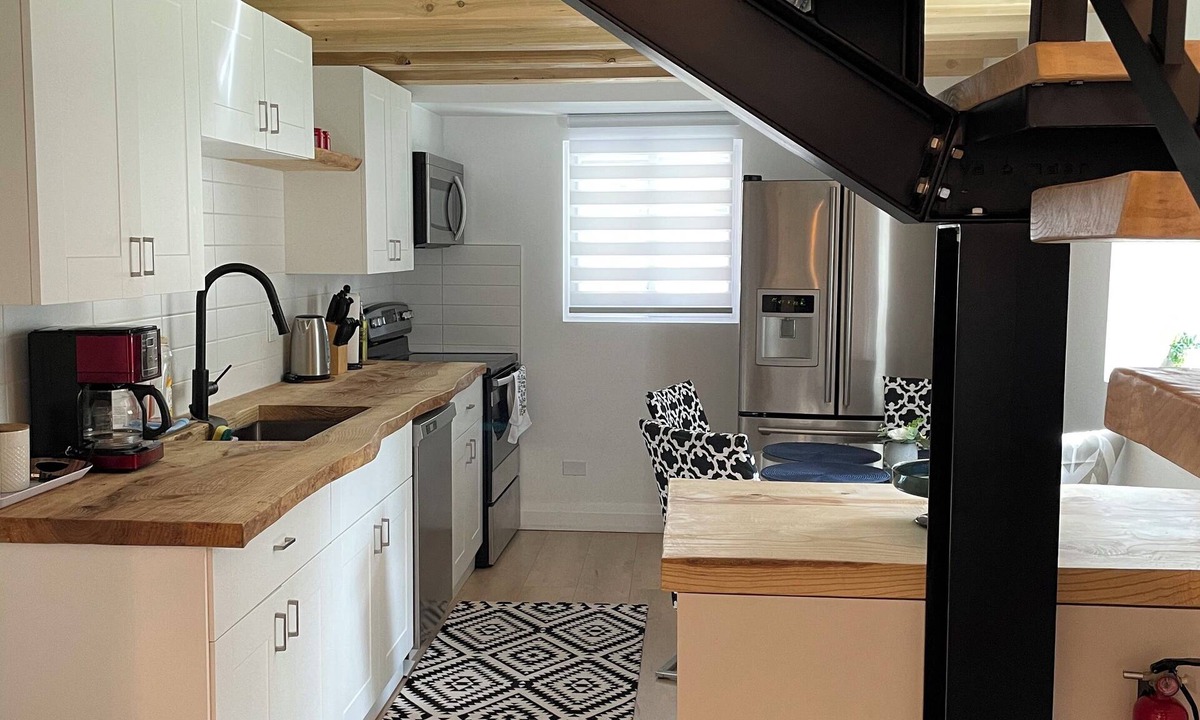 Township of Woolwich House | Cozy Cottage Style House by Grand River