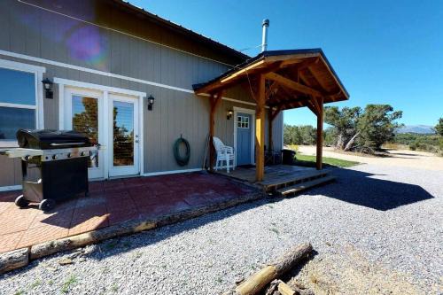 Blanding House | Cozy Cottage with Fire Pit and BBQ Nestled in the Cedar Trees in Blanding, Utah