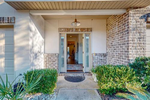 Epworth Acres House | Cozy island townhouse w/screened porch, shared pool, & serene pond views