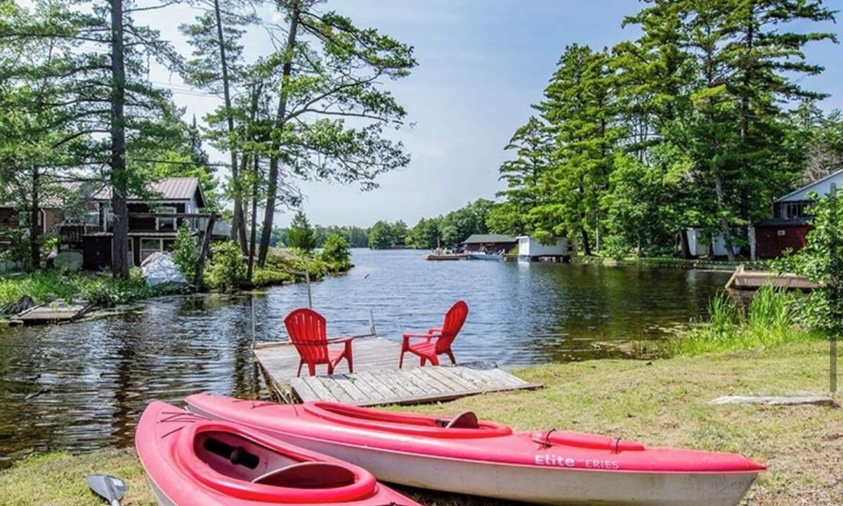 Big Chute Cottage | Cozy Lakeside Cottage Retreat with Kayaks, Paddle Boat & Sunset Waterfront Views
