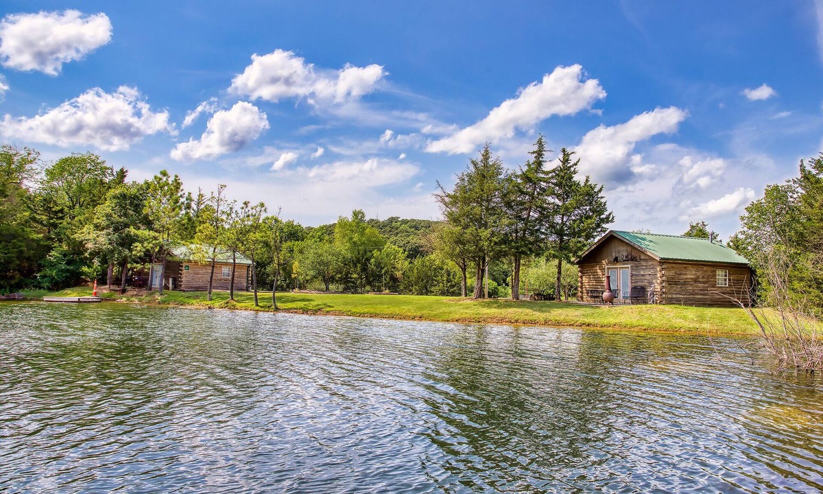 Sand Springs Cabin | Cozy Lakeside Log Cabin on a Private Lake. Once stayed by Sir Paul McCartney!