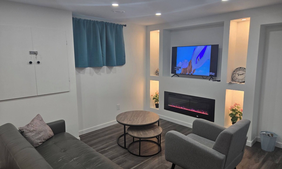 Winnipeg House | Cozy private bsmt suite |Bonavista |Fireplace |Workspace & nature-inspired decor