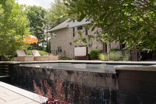 Elora Apartment | Cozy Private Suite with heated pool