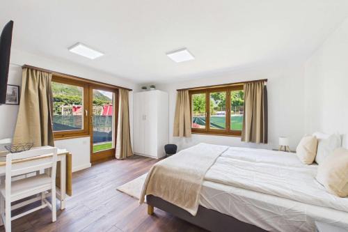 Gamsen Apartment | Cozy Studio with a Garden