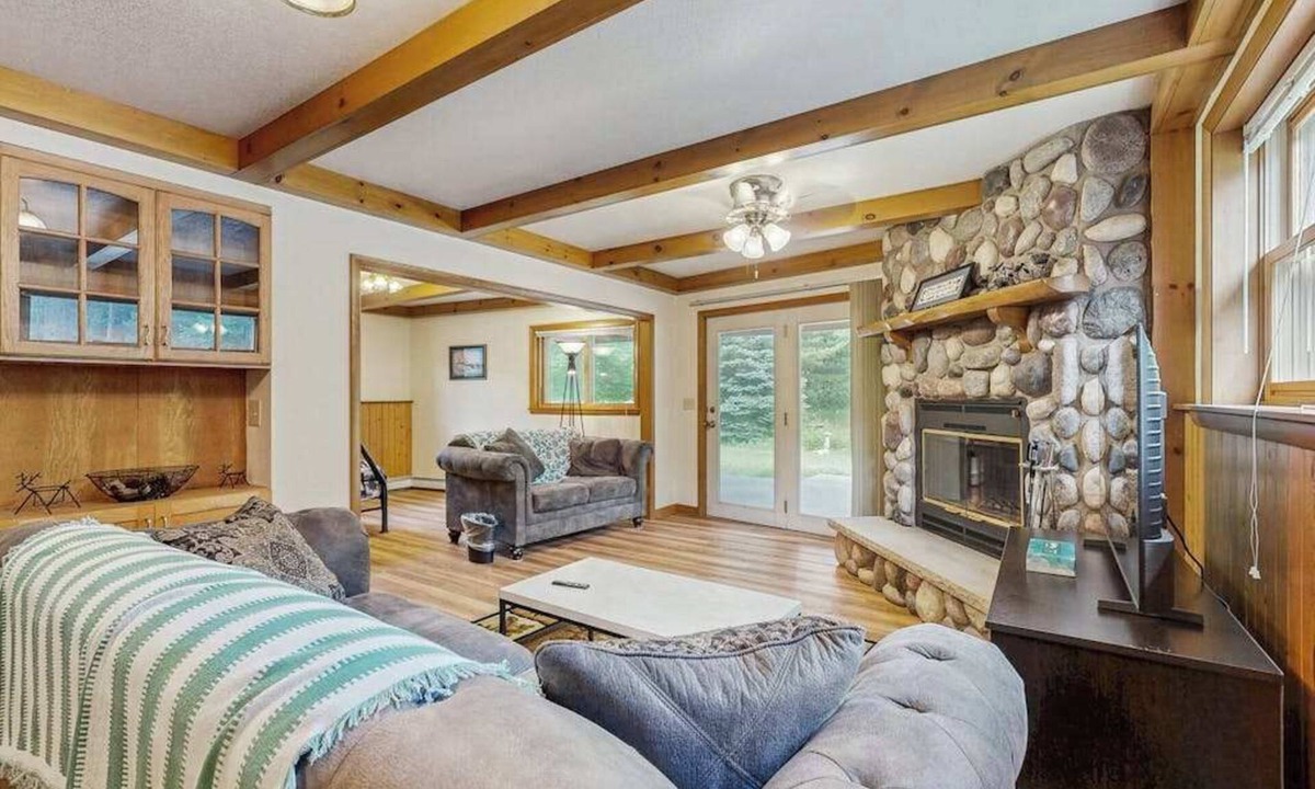 Friendship House | Cozy wooded duplex w/WiFi, full kitchen, shared W/D & near lakes & trails