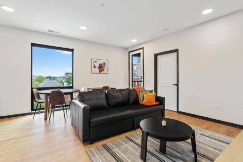 Lockerbie Square Apartment | CozySuites Mass with lounge and roof deck #6