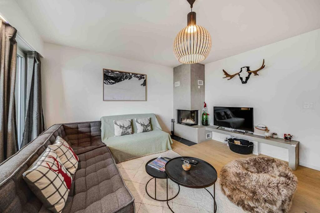 Noes Apartment | Crans center with fireplace and parking