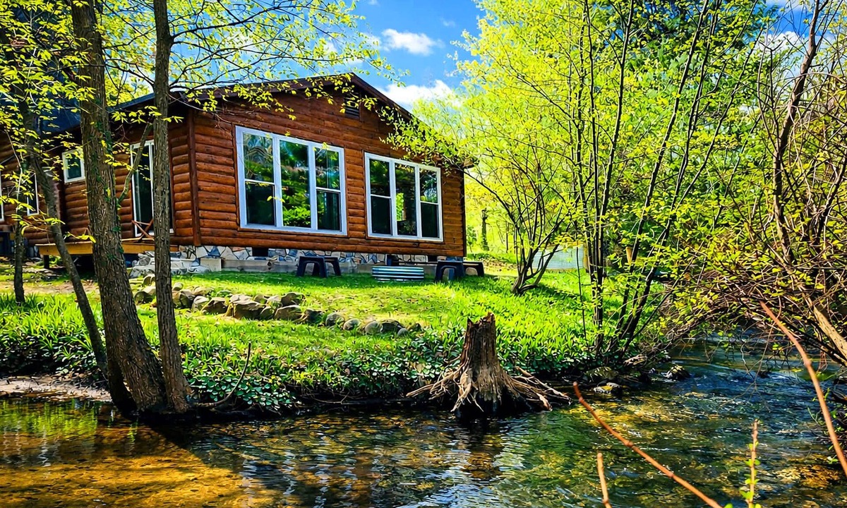 Traverse City Cottage | CreeksideHotTub WalkToBeach Uniquely Northern