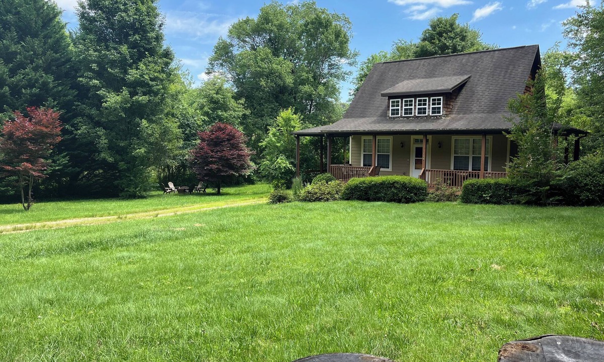 Candler House | Cute cottage just outside Asheville with EV charger. Won’t you be my neighbor?