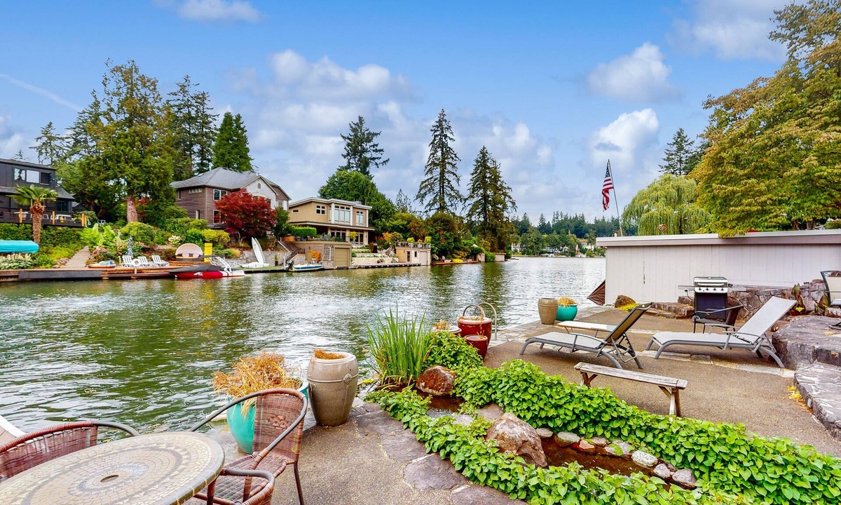 Blue Heron House | Delightful Retreat with Water Views, Fast WiFi, Gas Grill, & Furnished Patio