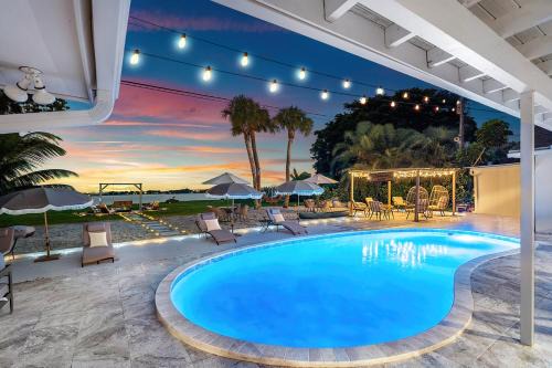 West Palm Beach Villa | Deluxe Waterfront Villa with BBQ, Pool and Game Room