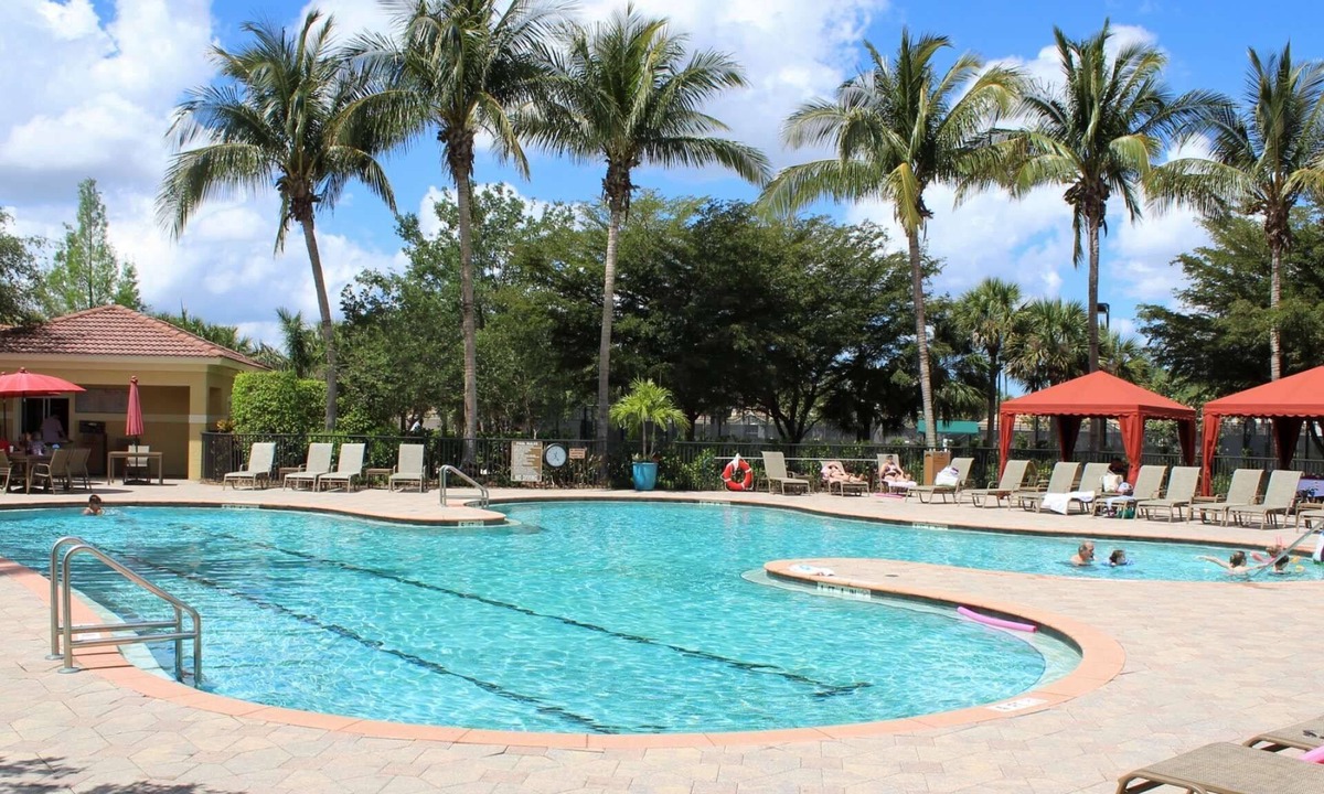 Fort Myers Condo | Desirable Gated Community, Country Club Lifestyle! Ground Floor, Pool, Tennis, Social Membership!