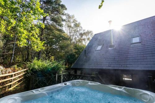 Farley House | Dimmingsdale, woodland lodge with hot tub for 8