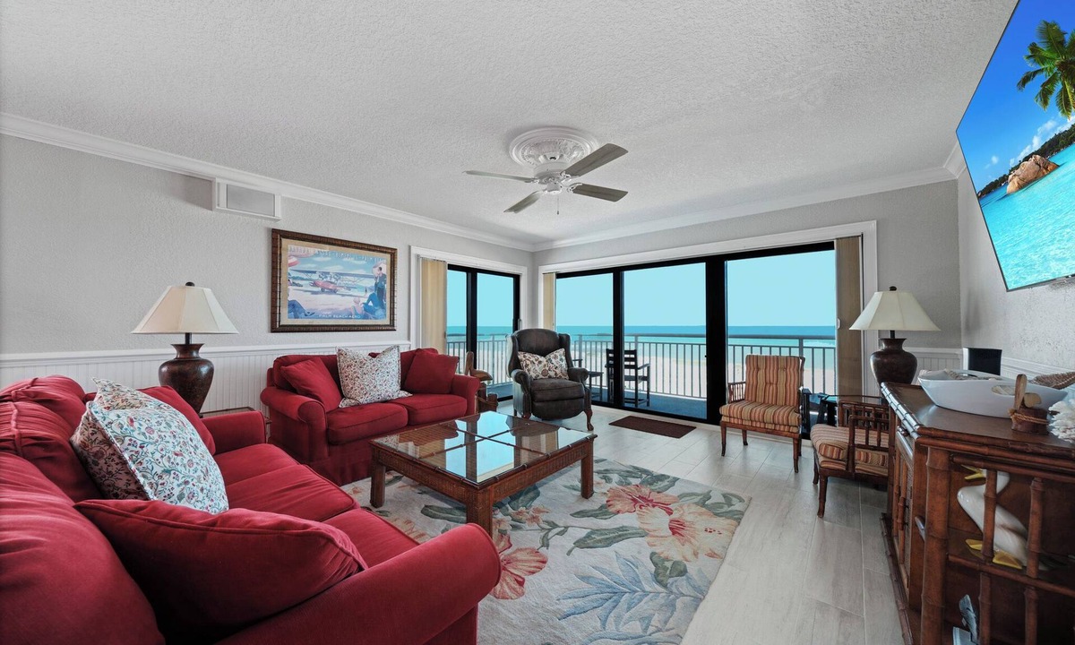 New Smyrna Beach Condo | Direct oceanfront corner 3/2 with a large wrap around balcony and heated pool