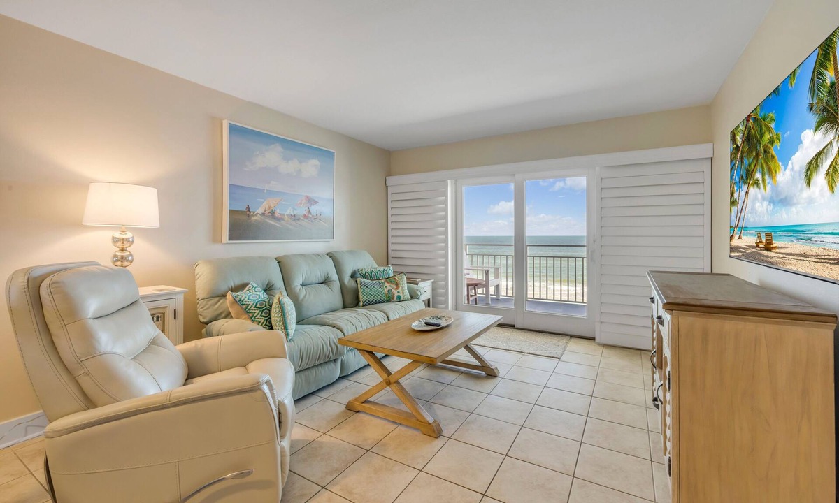 New Smyrna Beach Condo | Direct oceanfront 2/2 with private balcony, heated beachfront pool, and beach access
