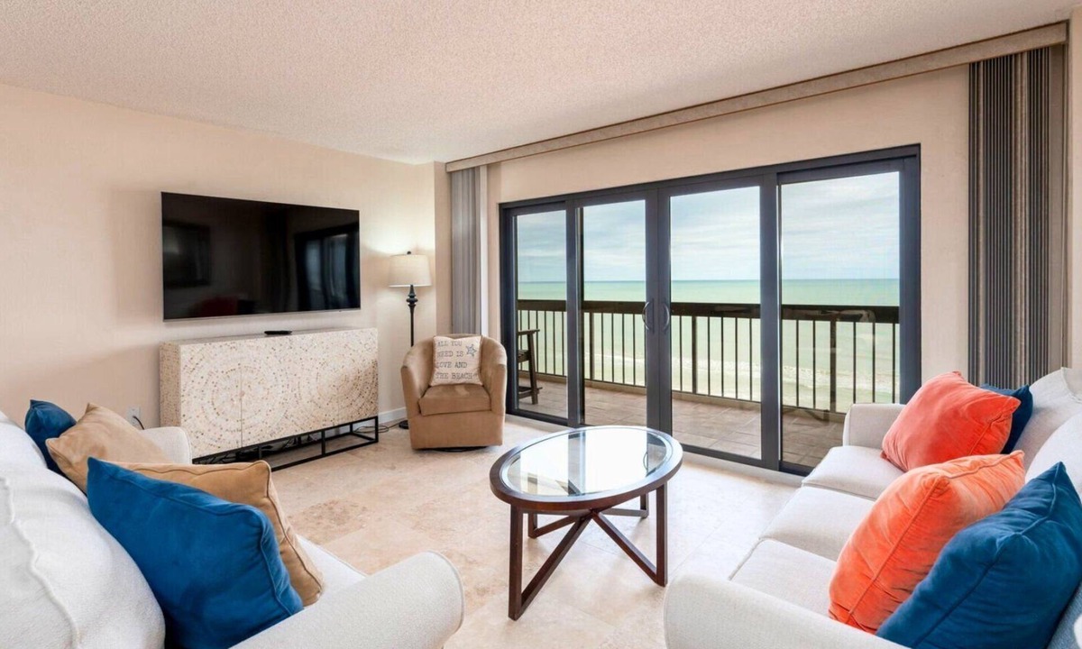Ormond-by-the-Sea Condo | Direct oceanfront corner condo with big balcony, heated beachfront pool and garage parking