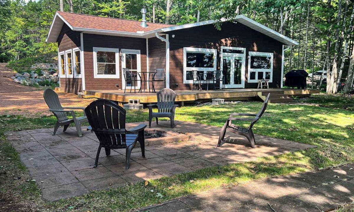 Minocqua House | Dog-friendly lakefront hideaway with docks, firepit, fireplace & W/D