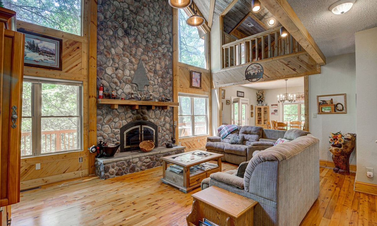 Wiley Cabin | Dog-friendly riverfront cabin w/waterfall view, large decks, firepit, Ping-Pong