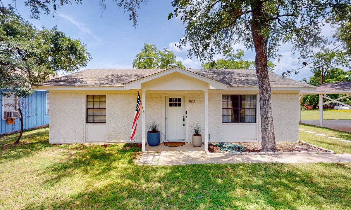 Granite Shoals House | Dog-friendly waterfront home with dock, grill, water views, patio, washer/dryer