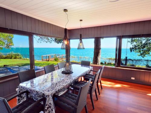 Amity Point House | Dolphins at Sunset