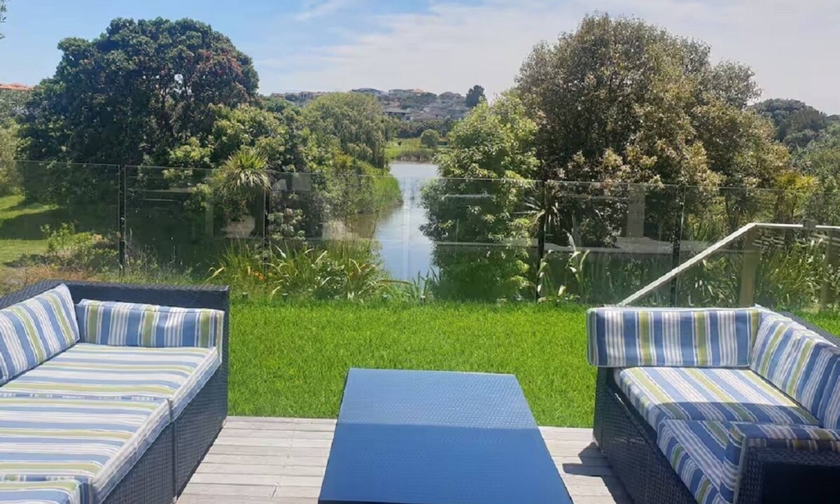 Gulf Harbour House | Down the steps. Two Bedrooms Lake views.