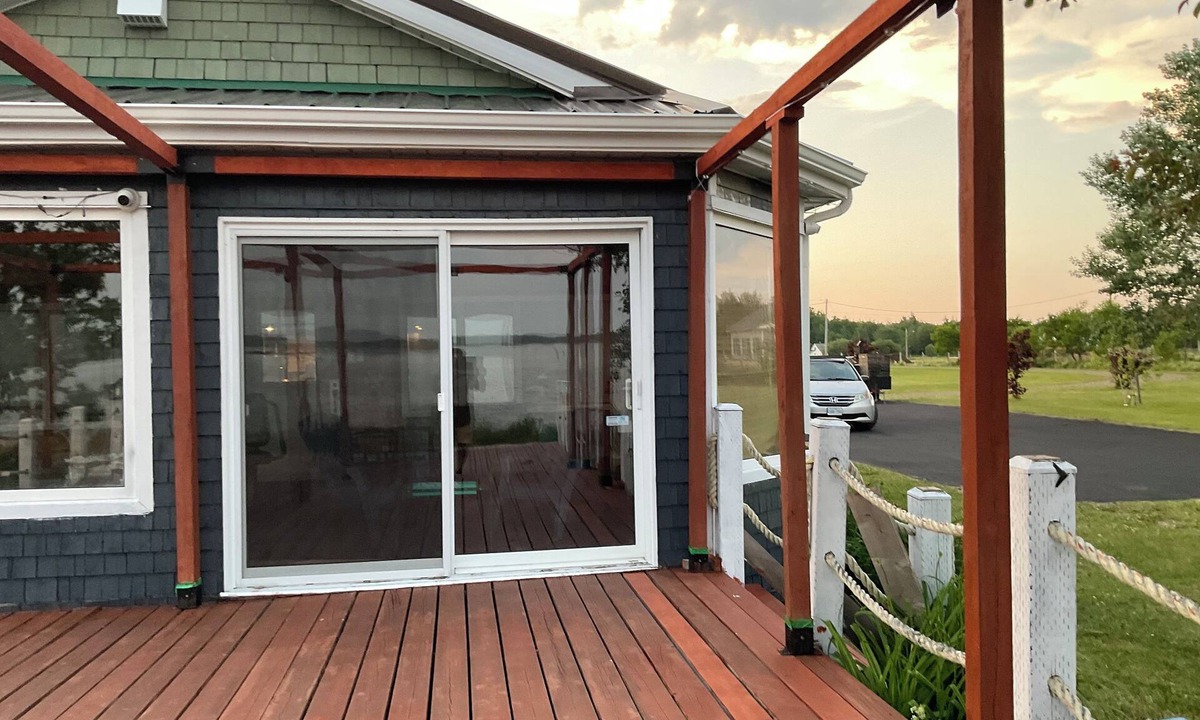 Gloucester County House | Drift into comfort at the Cozy Current. Your lakeside escape awaits you!