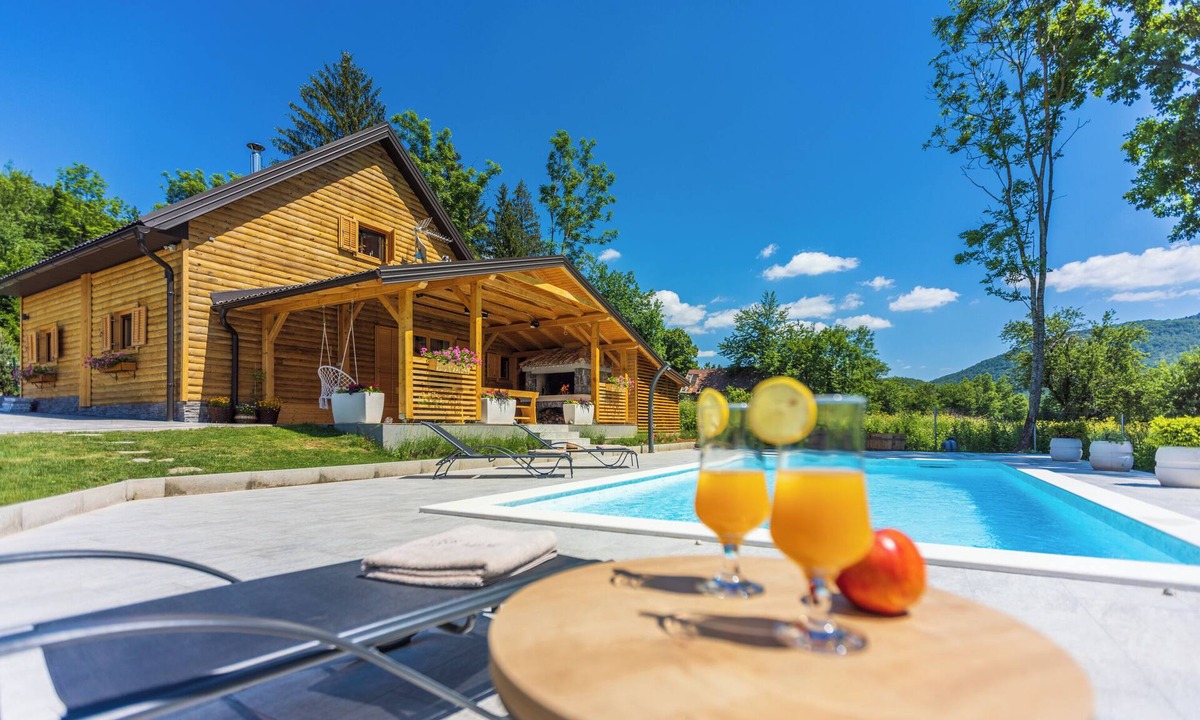 Gospic House | Eco-friendly mountain retreat with pool, jacuzzi, sauna, and panoramic Velebit views.