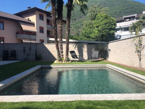 Arcegno Apartment | Elegant apartment with pool and parking