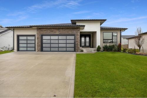 Waukee House | Elegant Modern Home & Patio