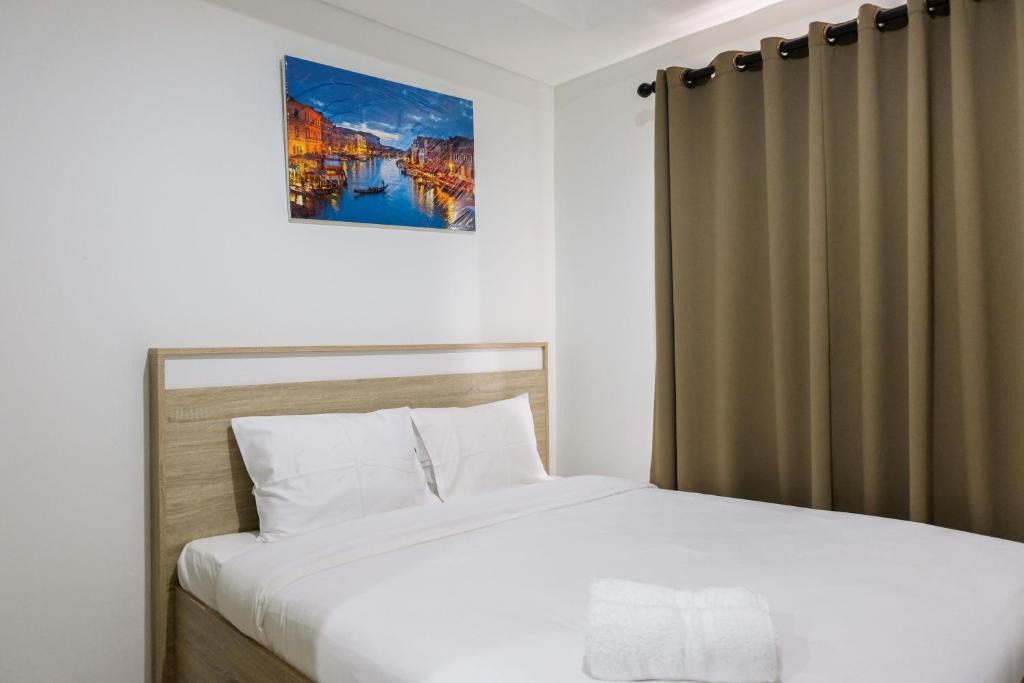 Pinang Apartment | Elegant Studio Apartment at Springwood Residence By Travelio
