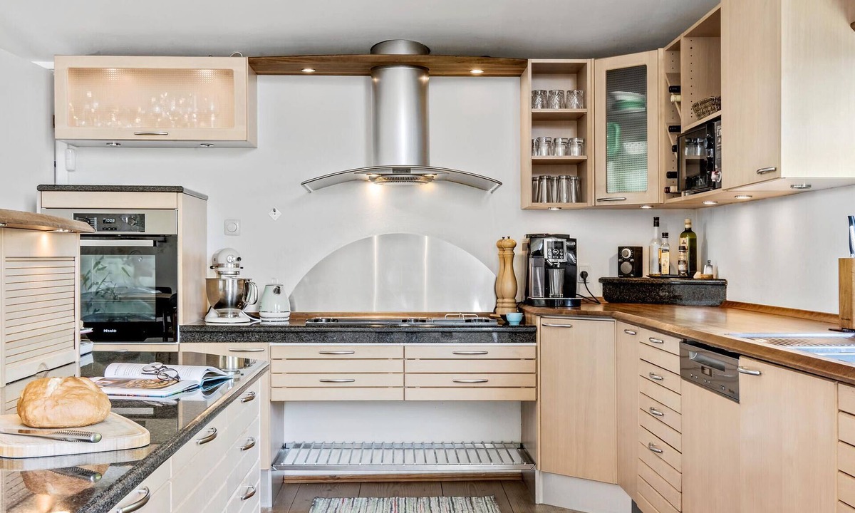 Daugard House | Enjoy a relaxing holiday in this holiday home with sea views near Vejle Fjord.