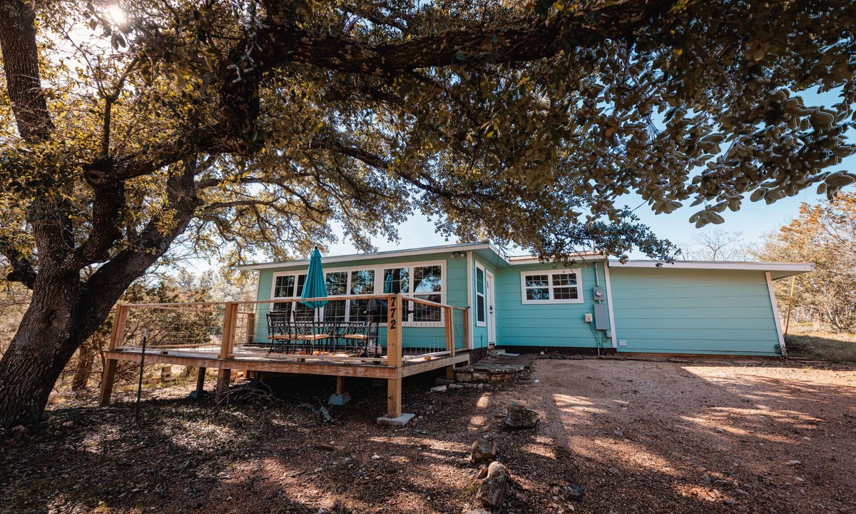 Sunrise Beach Village Cottage | Enjoy our speakeasy at our 2 bedroom cottage!