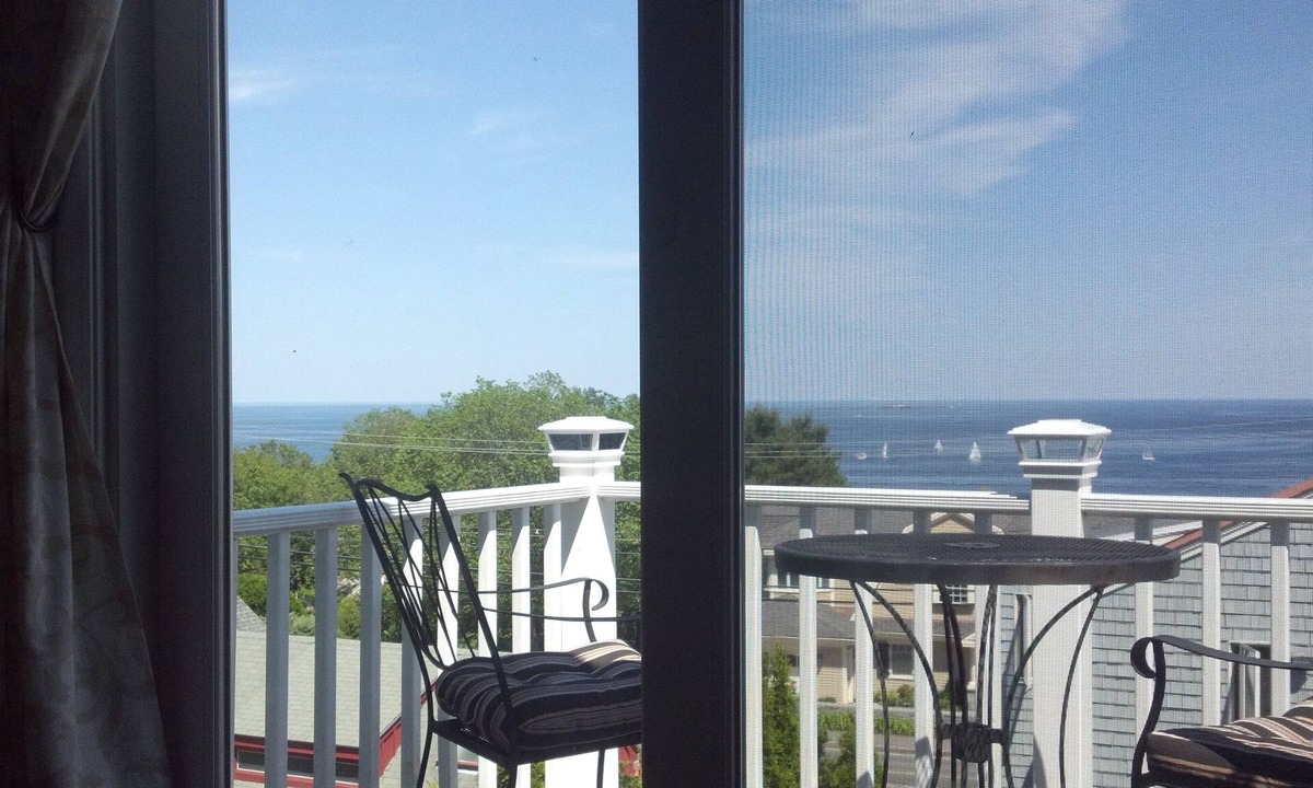Rockport Cottage | Enjoy this cozy cottage with panoramic ocean views.