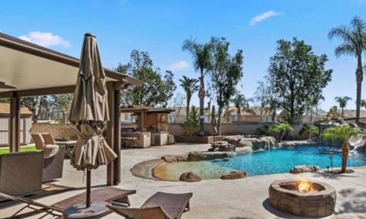 Ontario House | Enjoyable 4-bedroom house with a beautiful rock water fall slide swimming pool.