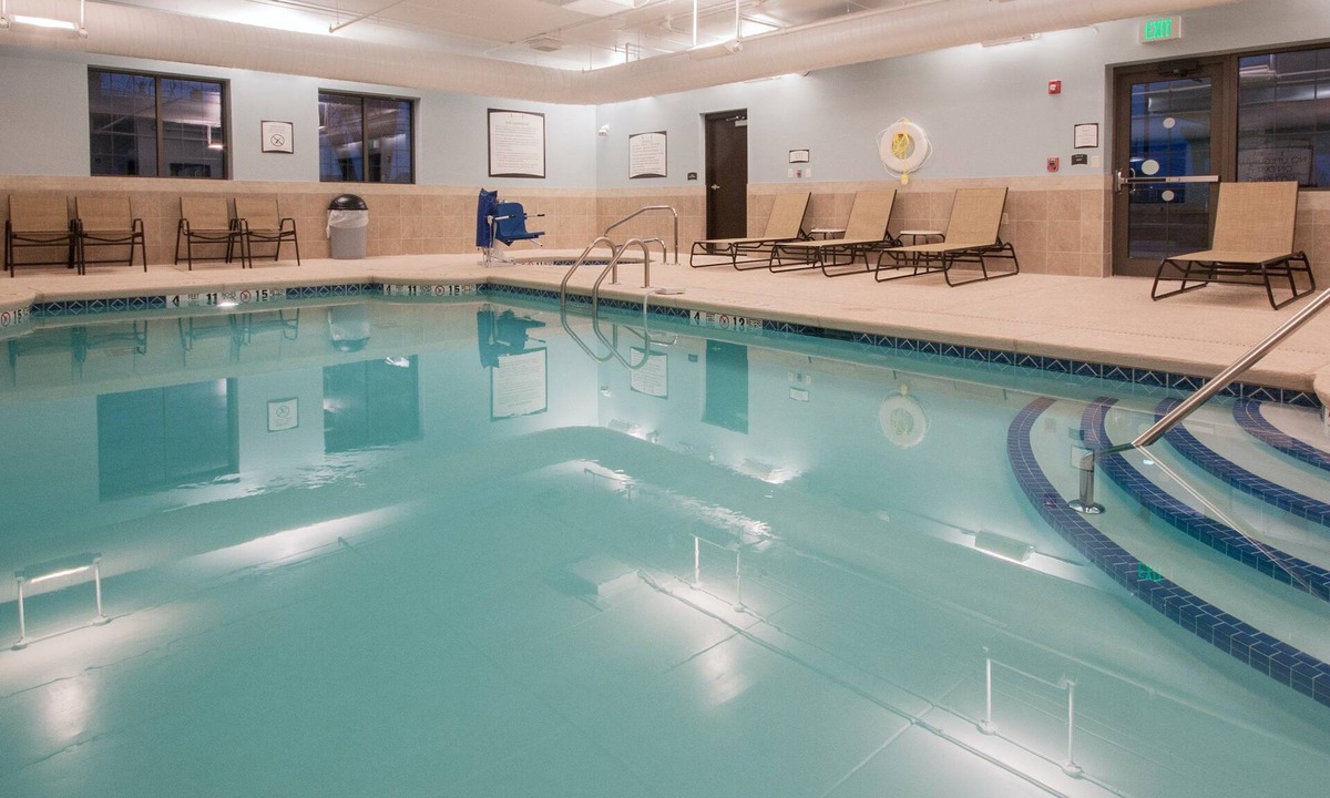 Amherst Condo | Equipped Suite | Free Daily Breakfast, Pool Access + Gym Access