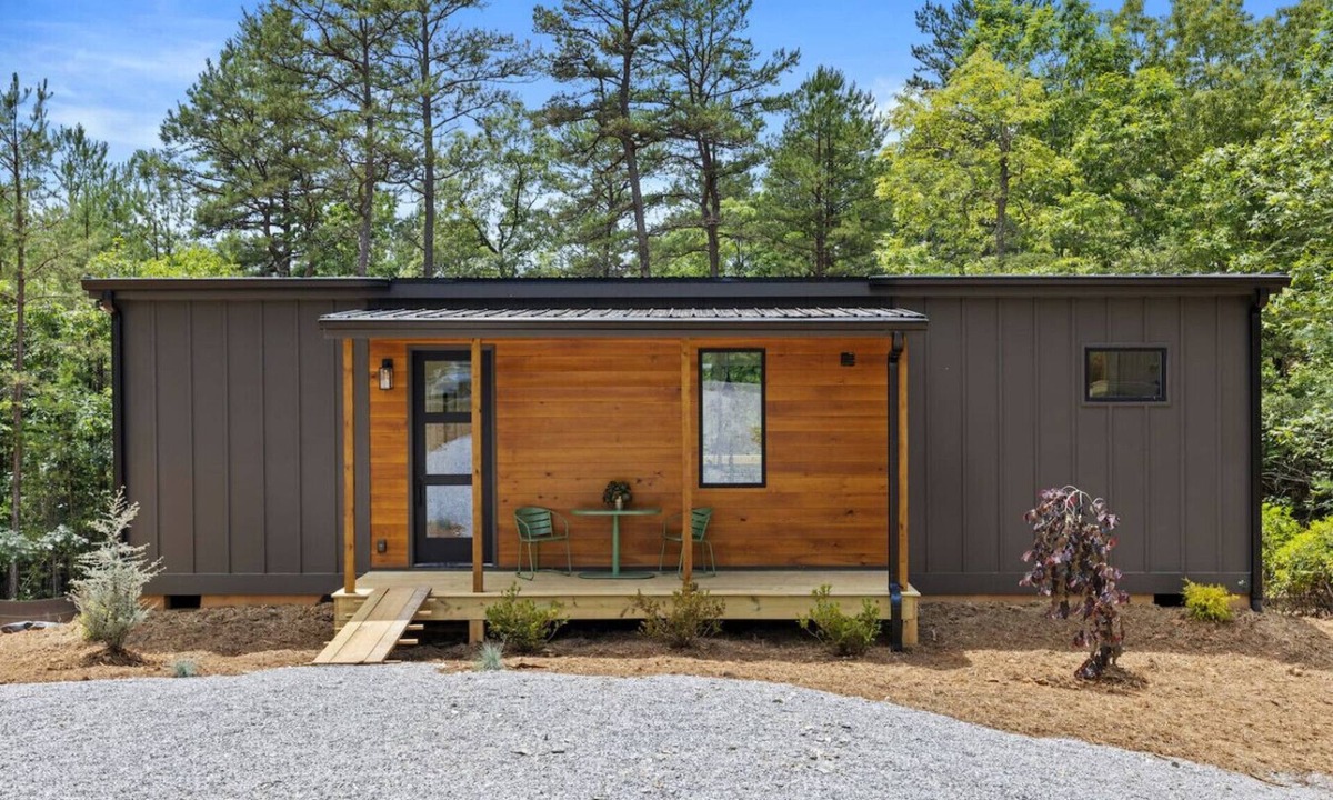 Young Harris Apartment | Escape to a 2BR/1BA tiny home in the N Georgia mountains. Cook meals, cozy up by the wood-burning stove, refresh in the spa-style shower, and enjoy crisp winter mountain air from your private deck. Perfect for city escapes and romantic weekends.