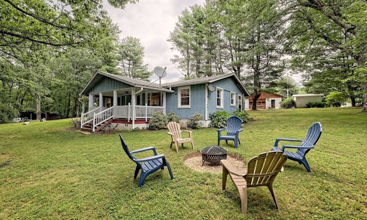 Scaly Mountain House | Escape to nature with this pet-friendly, family retreat just 15 minutes from Highlands! Perfect for hiking, relaxing, and playtime with the kids. Utilize the outdoor fire pit, indoor fireplace and the playhouse in the side yard full of games!