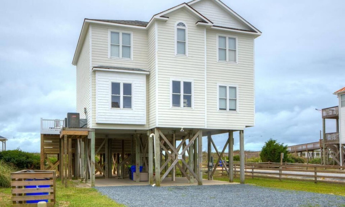 Yaupon Beach House | Experience luxury at Apollo, an oceanfront house in Oak Island with 5 bedrooms.