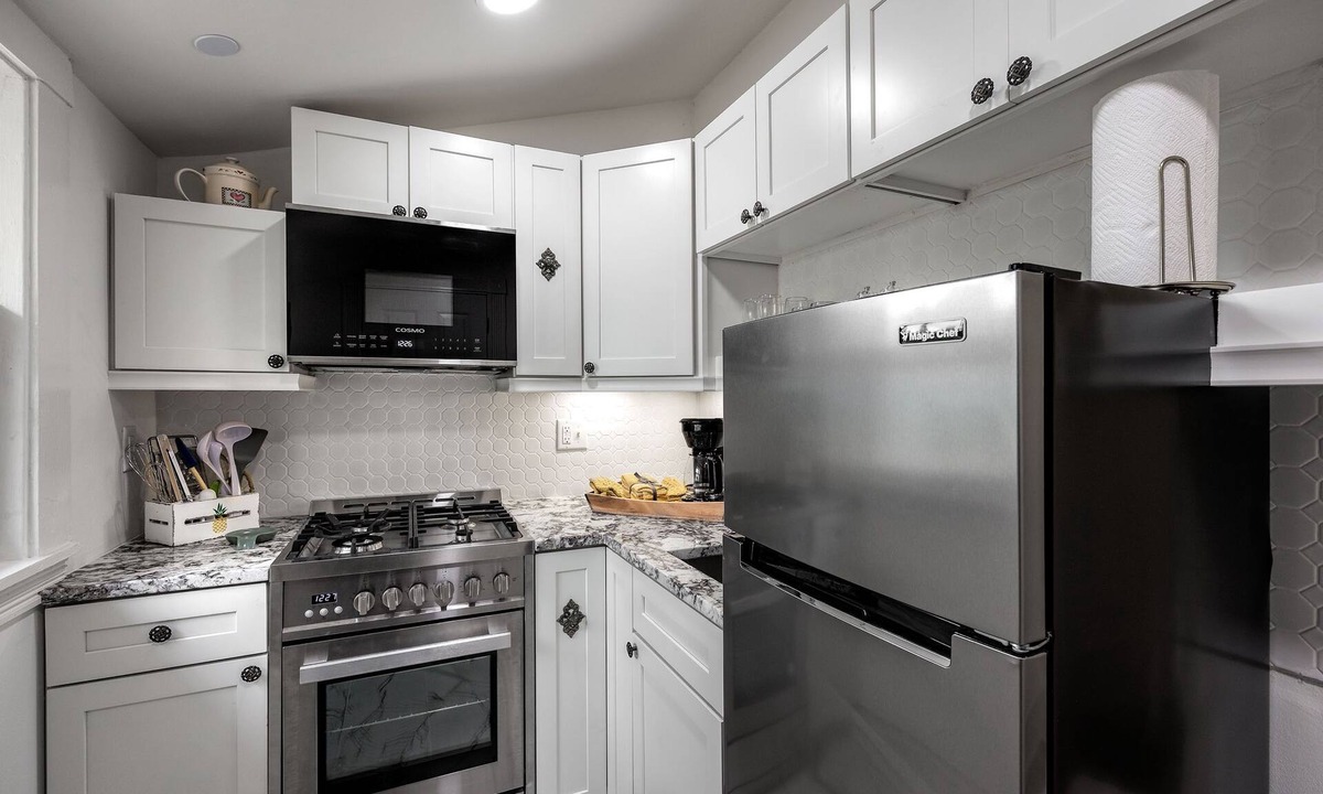 East of Broadway Apartment | Experience the Historic Armstrong Cottage in the Sunshine Suite