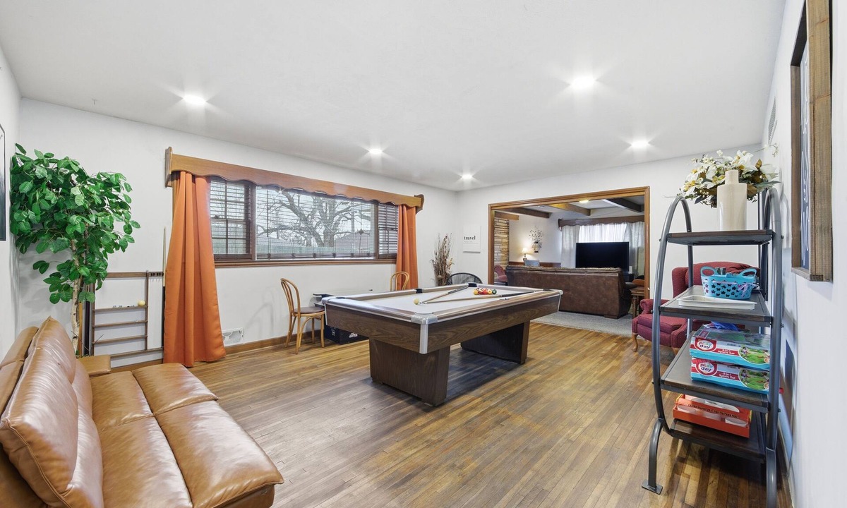 Wichita House | Experience Wichita living near WSU! Fire Pit, Pool Table, and Arcade games.