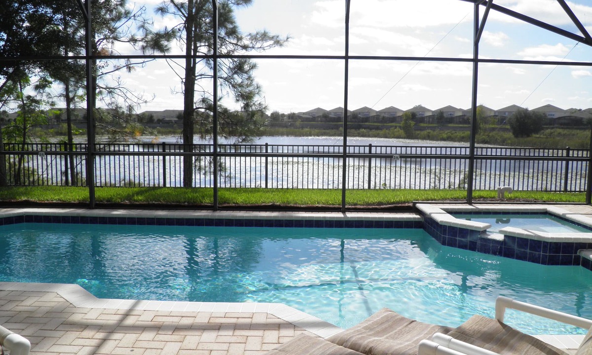 Windsor Hills House | Fabulous Lake View/South Facing Pool Home- Game room -2 Miles to Disney!