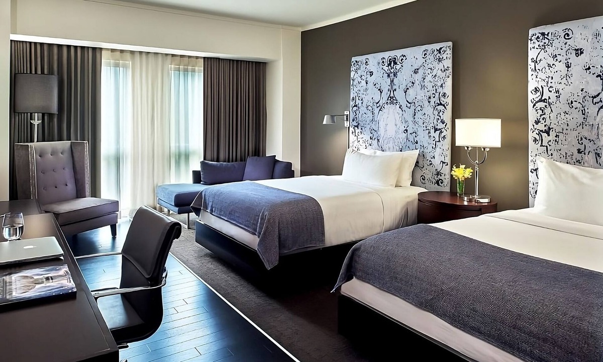 West Plaza Hotel | Family Getaway! 2 Spacious Units, Pool, Pets Allowed Near Rockhurst University!