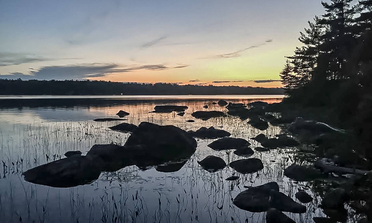 Orland House | Fantastic property on the pond with firepit, wraparound deck, & kayaks