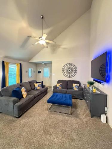 Porter House | FIFA World Cup Retreat Cozy Modern Home Covered Patio With TV