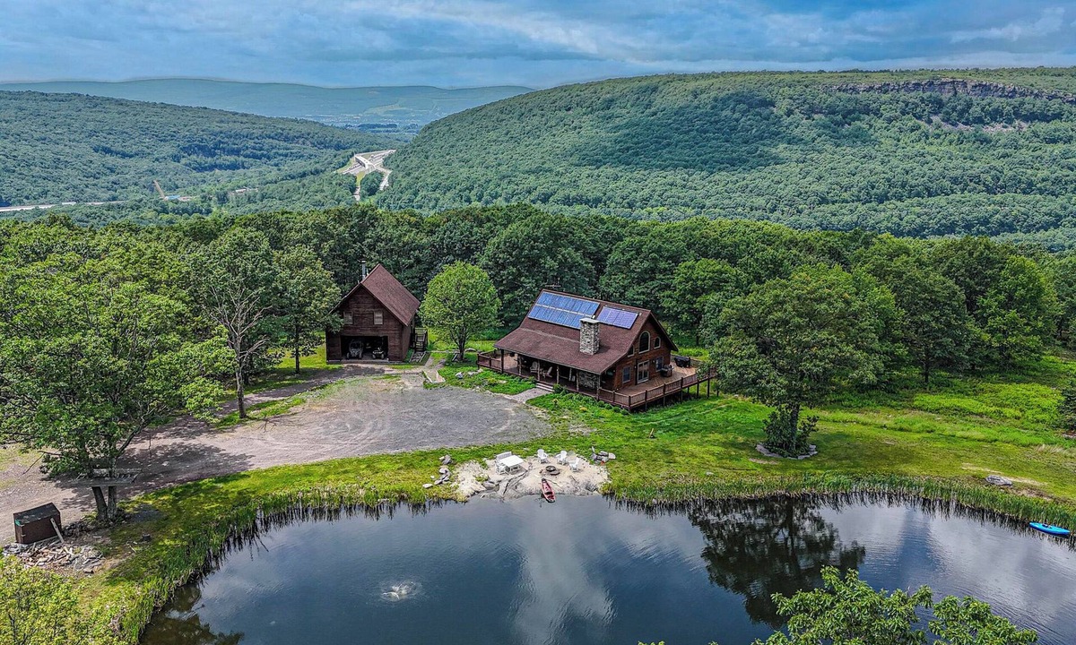 Mt Cobb Villa | Fire Pit & Game Room: Waterfront Poconos Cabin